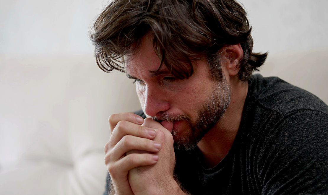 Distraught man after a traumatic event