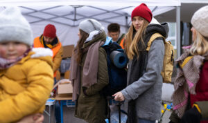 Young women in humanitarian aid line