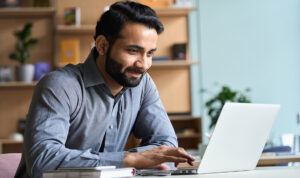 Man taking an advanced EMDR training on laptop